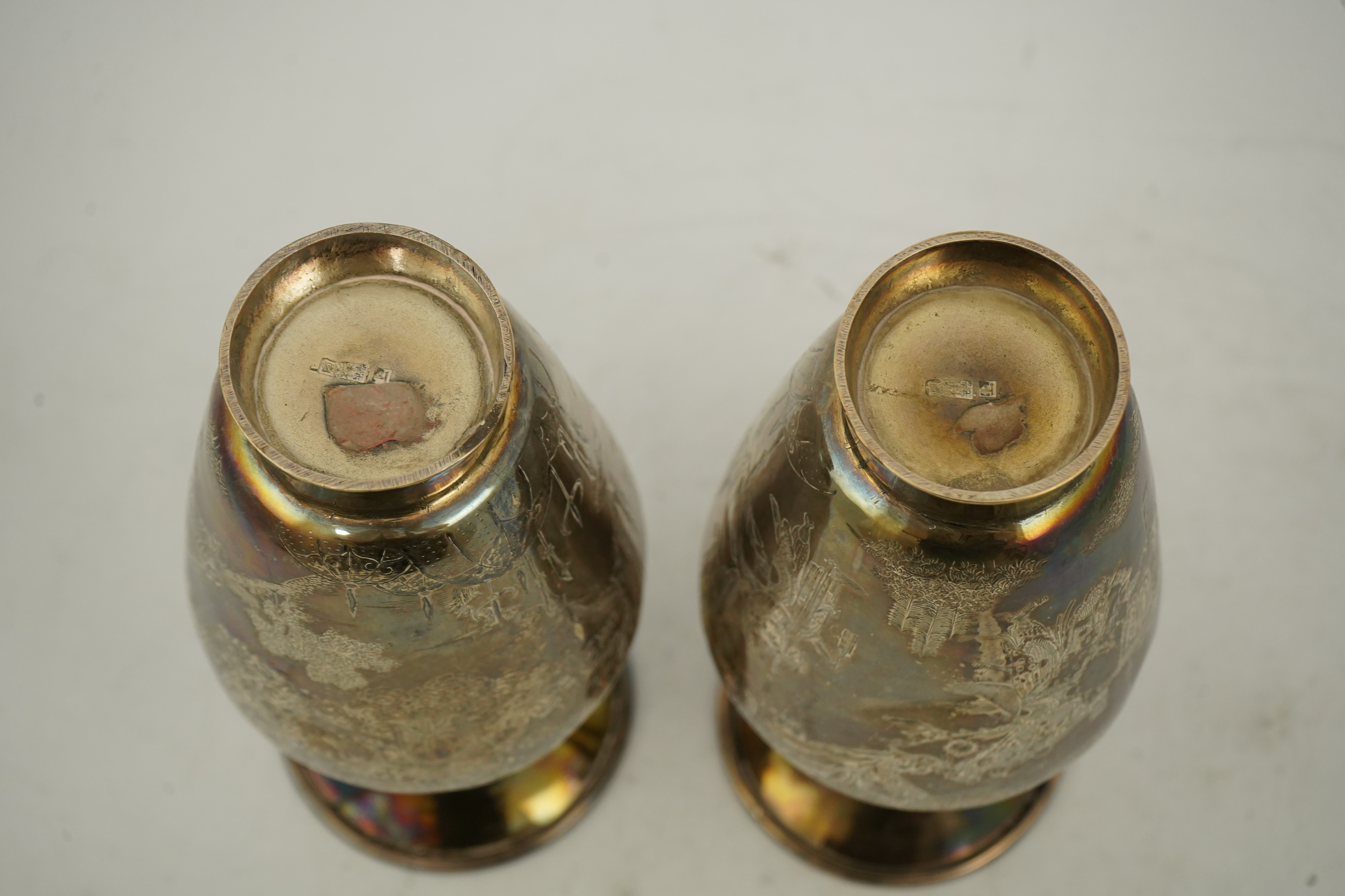 A pair of Chinese silver ‘immortals’ vases, late 19th century
